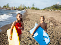 Girl and Boy at Hanover Beach with Bodyboards 2019