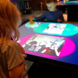 Kids learning about comedic props at the National Comedy Center