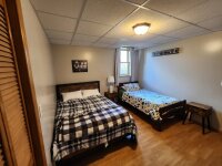 Lakeside Meadows bedroom with double bed and single bed