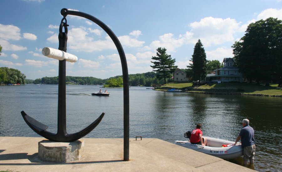 Two people lauchinga boat in Findley Lake