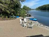 Blue Canoe on Cassadaga Lakes with dock pedal boat and adirondack chairs