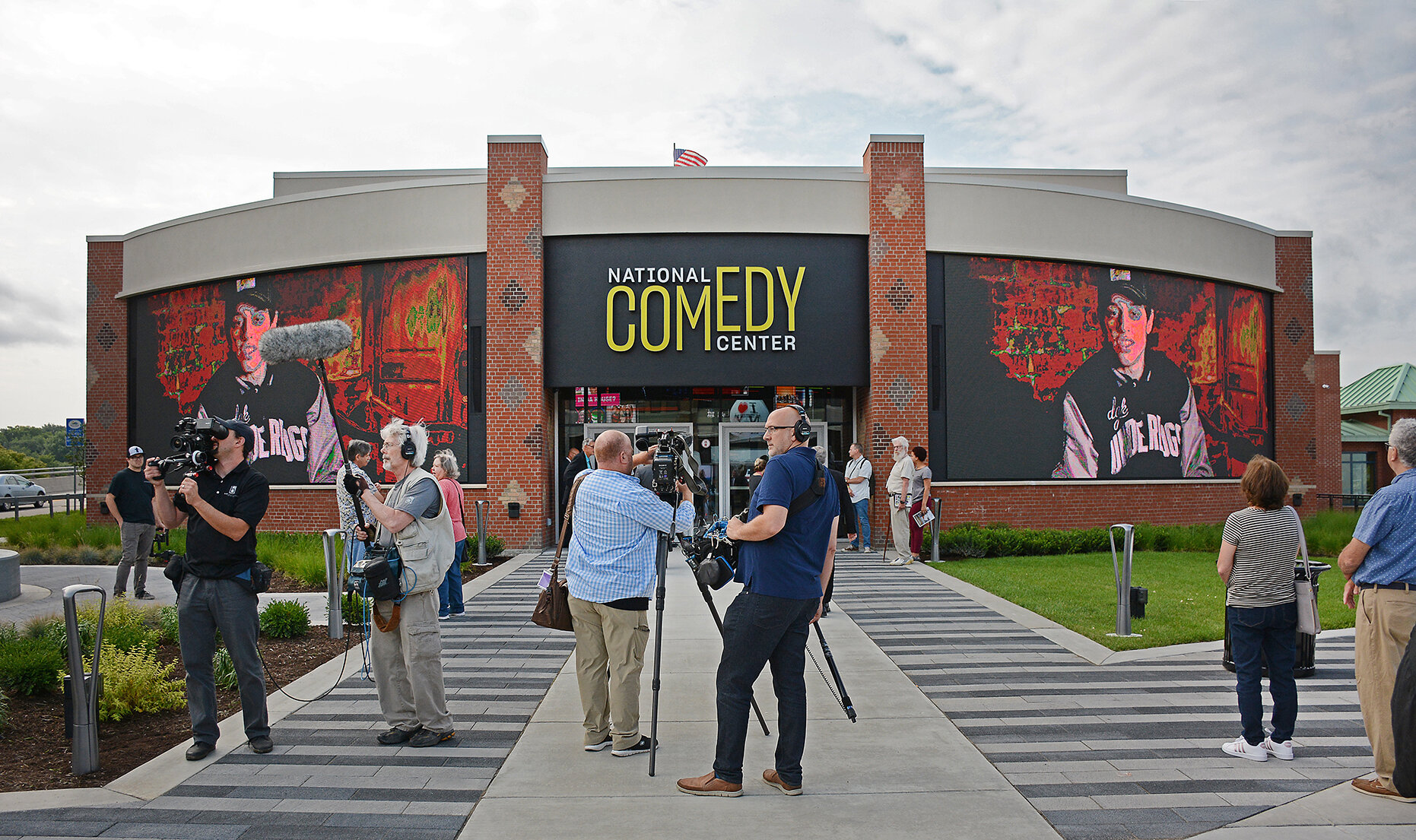 Press gathered outside the National Comedy Center