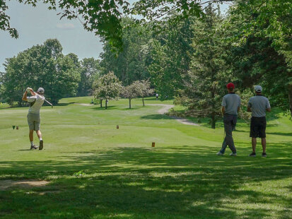 Four men golfing in Chautauqua County