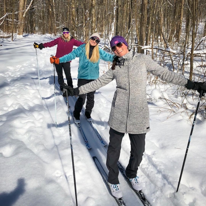 Three friends cross-country skiing on Chautauqua County trails