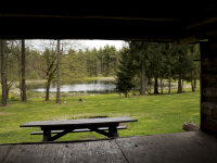 Eastside Overland Trail view from inside leanto looking out at picnic table and pond