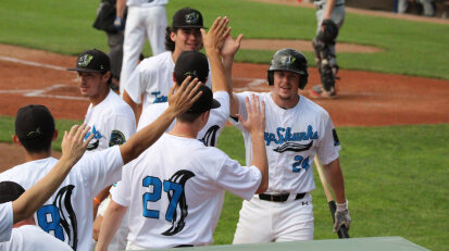 Jamestown Tarp Skunks Players Celebrate