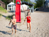 Kids playing on Hanover Beach Playground 2019