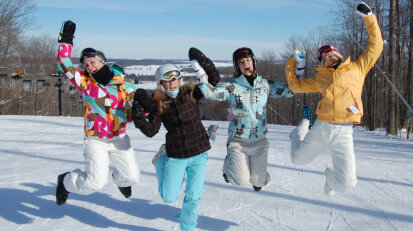 A group of happy skiiers at Peek'n Peak Resort in Chautauqua County