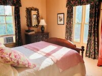 The Plum Bush House bedroom bed with furniture