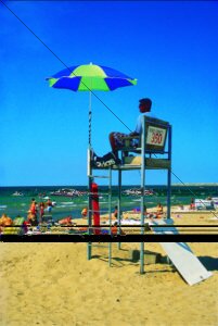 Lifeguard station with lifeguard on duty at Sunset Beach.