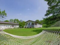 Lakeside Meadows exterior with hammock