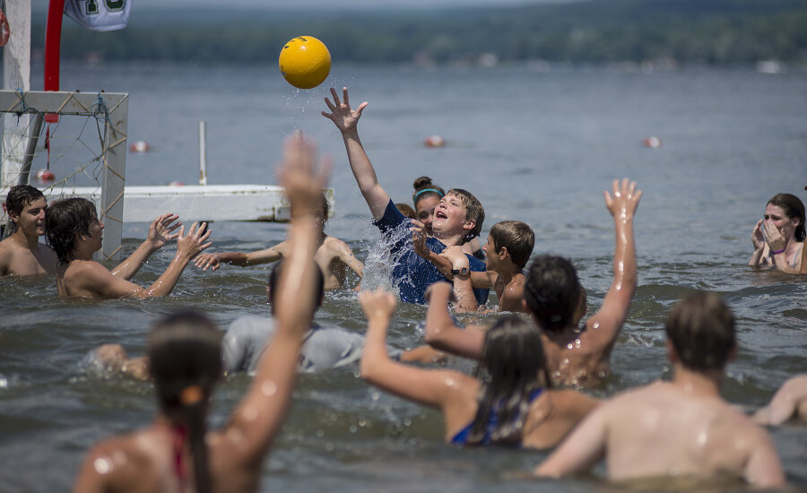 Kids at a summer camp playing handball in Chautauqua Lake