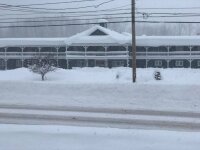 Snow-covered Webb's Year-Round Resort Exterior