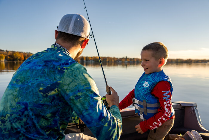 father and son fall fishing