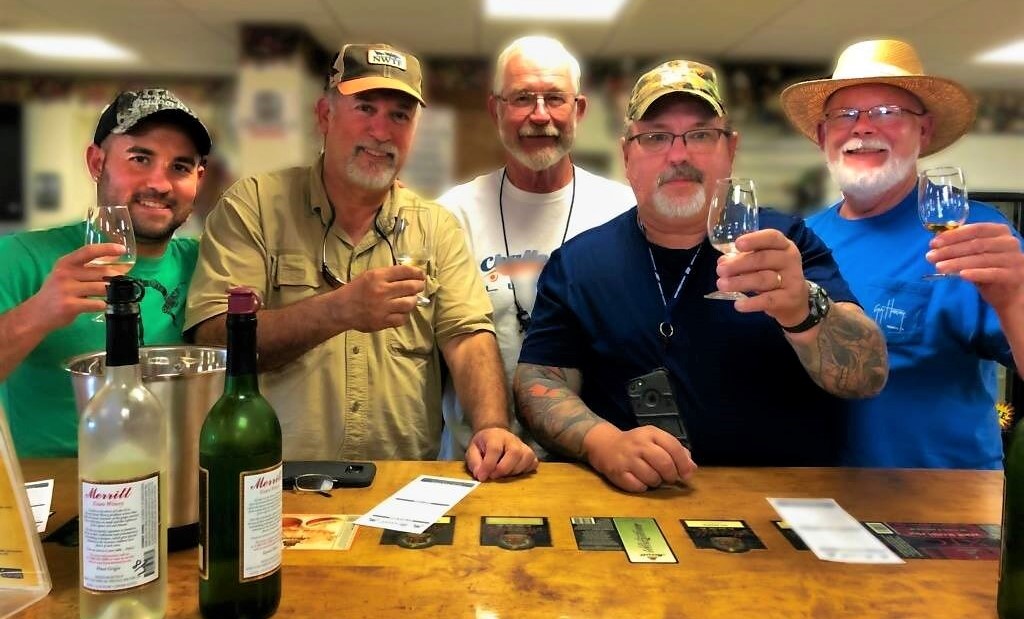 Fishermen visiting  a winery on Lake Erie Wine Trail