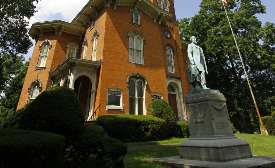 Fenton History Center exterior with statue